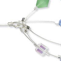 Beading wire looped around wrapped loop